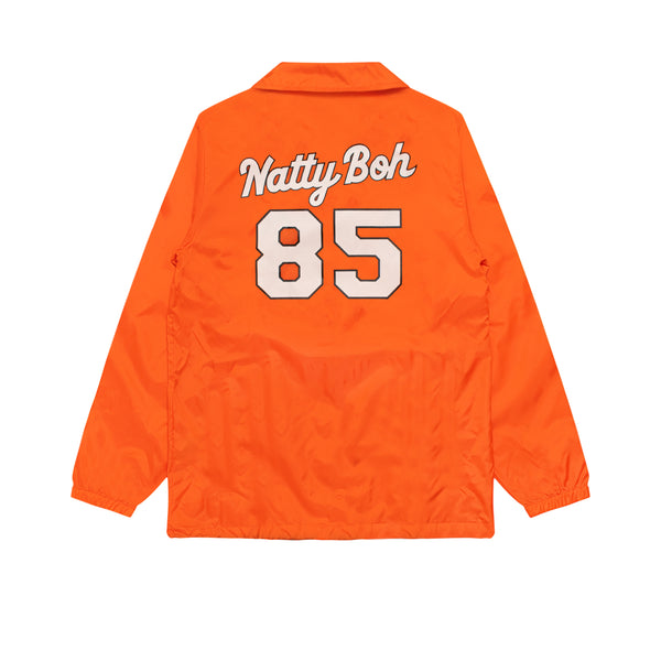 back of coaches jacket with "natty boh" and number eighty five below it 