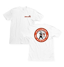 front of white t-shirt with "baltimore strong" on pocket next to back of t-shirt with "baltimore strong" and Mr. Boh filling up a beer design 